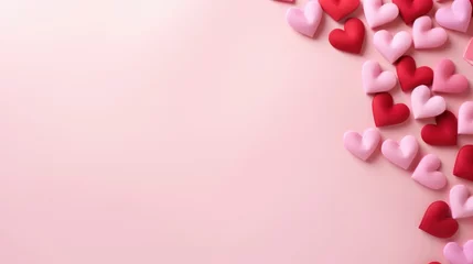 Foto auf Alu-Dibond A pink background with lots of red and pink hearts. Valentines day background with copy-space. © tilialucida