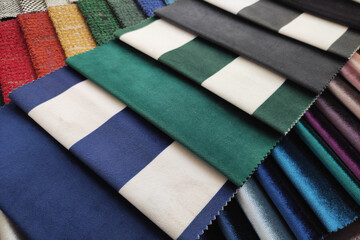Fototapeta na wymiar Colorful upholstery fabric samples in different colors