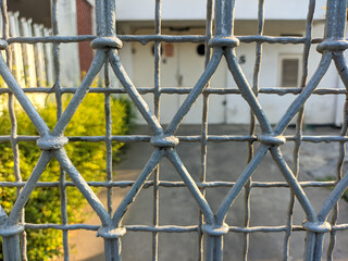 close up of grey metal fence