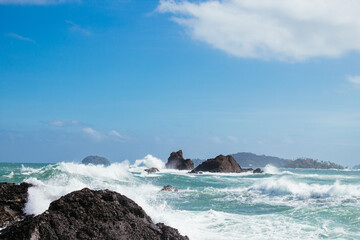 waves crashing on rocks