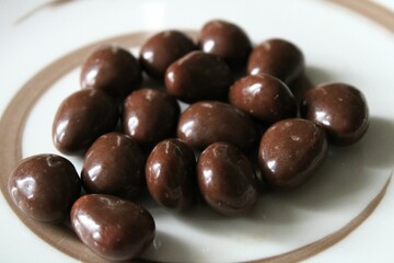 bowl of chocolate covered almonds 