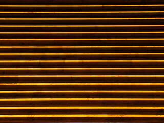 Empty seat rows striped zoomed view during an evening visit in Panathenaic Stadium of Athens,...