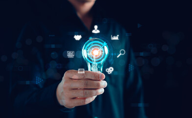 Digital marketing solution communication and Global Internet network connection concept. Businessman holding light bulb, Application smartphone, Sales Strategy, big data, Research finance analyst.