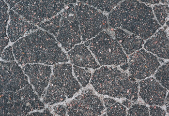 Background, texture, top view of wet asphalt with cracks on a street road. Photography,...