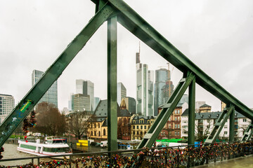 Panorama  of Frankfurt through Iron Footbridge with skyscrapers on Square of  Willy Brandt