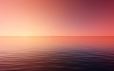 Calm sea reflects the sky's gradients of pink and orange hues.