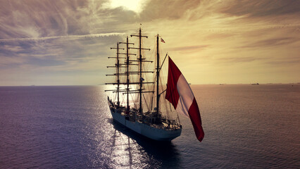 Aerial drone photo of beautiful three mast barque or barc type classic sailing wooden boat with...