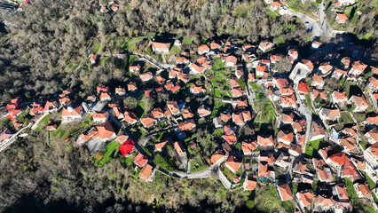 Aerial drone photo of iconic small traditional village of Megalo Chorio built on a mountain slope near famous village of Karpenissi, Evrytania, Greece
