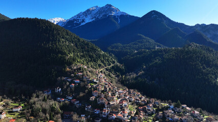 Aerial drone photo of iconic small traditional village of Megalo Chorio built on a mountain slope near famous village of Karpenissi, Evrytania, Greece