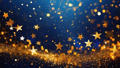 Fototapeta na wymiar Gold stars, glitter, and sparkles on blue background
