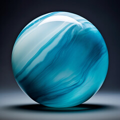Fotografia con detalle y textura de esfera de marmol de tonos turquesa, sobre fondo oscuro