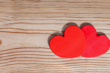 Fototapeta premium wood panel in the shape of two hearts