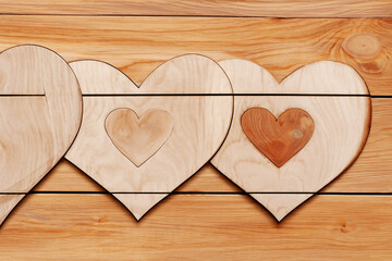 wood panel in the shape of two hearts
