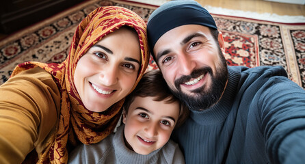Modern muslim family taking selfie in living room