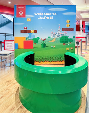 Tokyo, Japan. Dec 29, 2023. A Mario Bros green pipe photo booth display at the Narita Airport.