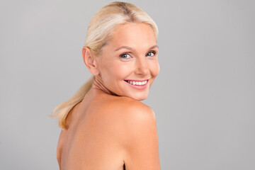 Portrait of happy smiling retired lady feel young after nourishing morning fresh shower isolated on...