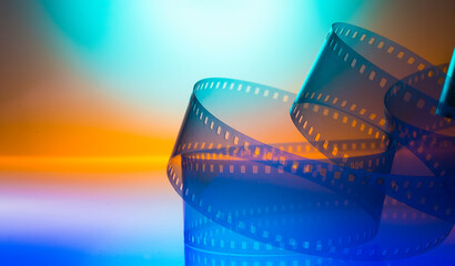 multicolored cinema background with film strip