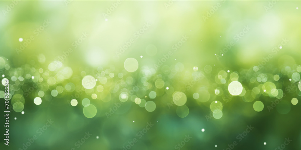 Poster blurred green background with sparkling bokeh lights and soft light spots.