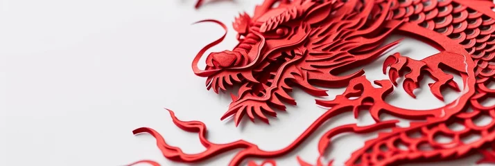 Fotobehang Close up of red paper cut art of Chinese dragon isolated on one side of white background with copy space, 3d paper cutting Chinese new year celebration background with space for text, greeting cards. © Jasper W