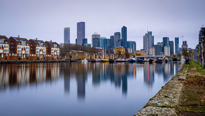 Fototapeta na wymiar View of skyscrapers in London city as seen from Surrey docks, England