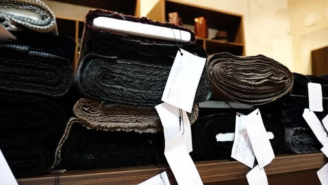 Fashion fabric samples with different color and texture at tailor atelier