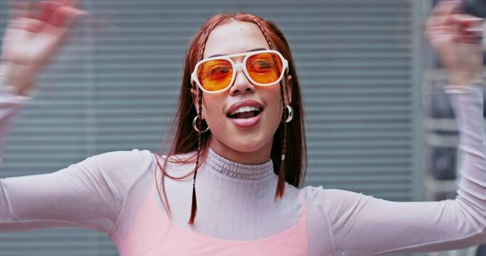 Sunglasses, face or woman in city with fashion, urban style and cool clothes with attitude or swag. Outdoor, travel or confident girl on holiday vacation with trendy hair, freedom and pride in town