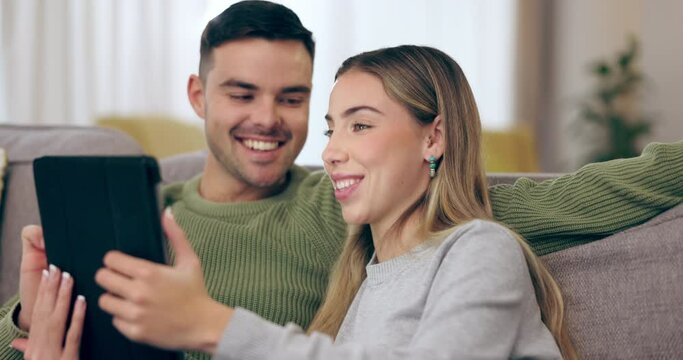 Home, love and couple on a couch, tablet and streaming movies with social media, email and conversation. Lounge, man or woman on a sofa, technology or app for fun, talking or search internet for info