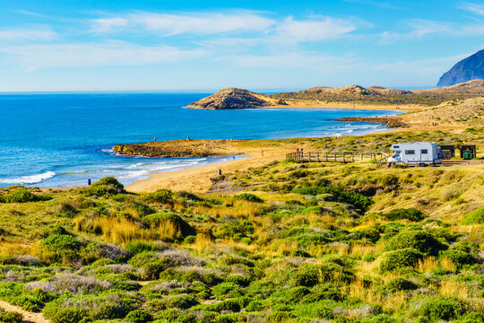 Spanish coast with caravan camping in the distance