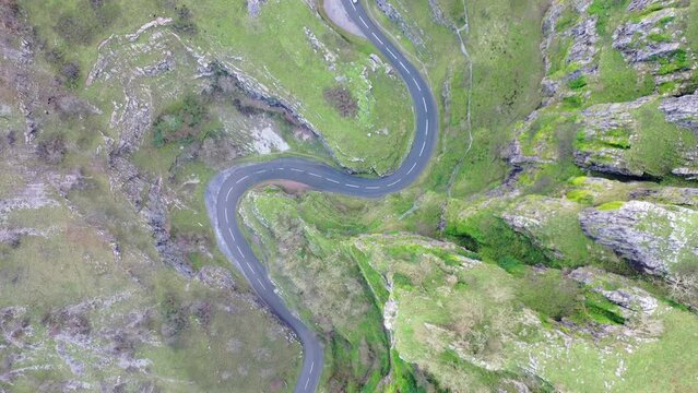 Aerial shoot of car driving through cheddar gorge