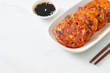 Korean Kimchi pancake or Kimchijeon - Fried Mixed Egg, Kimchi, and Flour