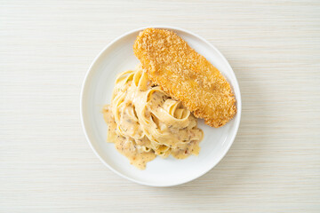 fettuccine pasta white cream sauce with fried fish
