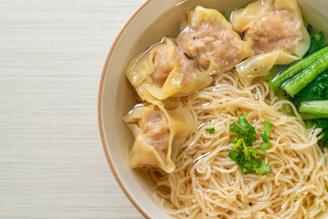 egg noodles with pork wonton soup or pork dumplings soup and vegetable