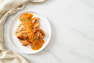grilled chicken steak with red curry sauce