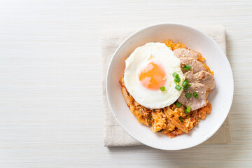 Kimchi fried rice with fried egg and pork