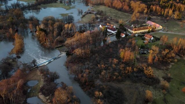 Flooded small power station at the nearby farm. Drone.