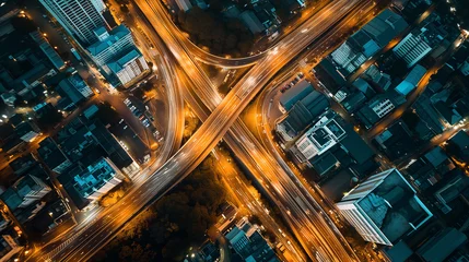 Stoff pro Meter Aerial view of highway and overpass in city, night city, Modern construction design of traffic ways to avoid traffic jams, Generative ai. © Sunshine