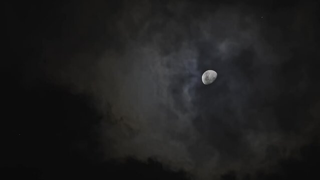 Clouds passing by moon at night. Full moon at night with cloud real time. mystery fairyland scene.