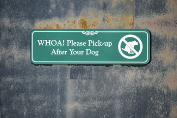Please pick up after your dog sign.
