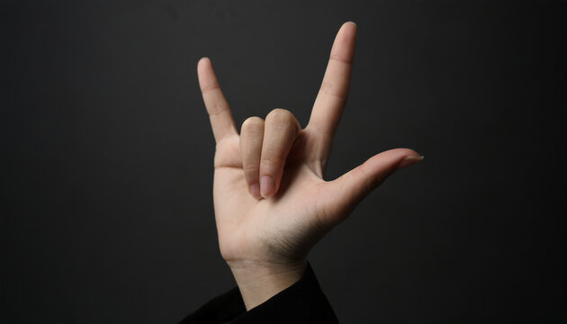 Hand sign, I love you, right hand, female, close-up, black background