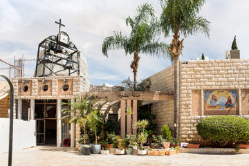 The courtyard with bell tower of Greek Orthodox Church of the Annunciation in Nazareth old city in...