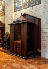 Large wooden confessional room on the top floor of the Church of Annunciation in the Nazareth city in northern Israel