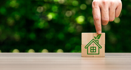 Eco-friendly houses prioritize sustainability. Utilize energy-efficient design, renewable energy sources, Green House, Concept the development of sustainable construction technologies and green living © Sutthiphong