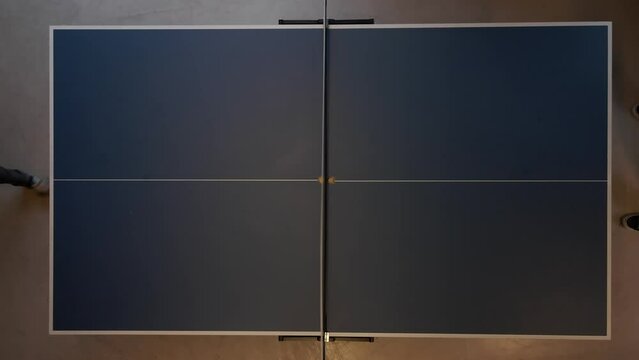 Top down shot showing table tennis ping pong game, drone shot