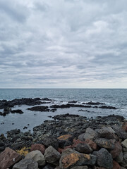 
This is a Jeju Island beach with basalt rocks.