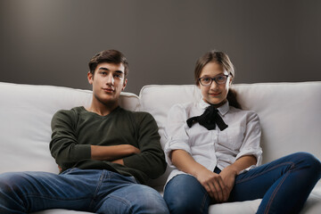 Comfortable companionship, man and woman on sofa
