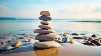 Keuken spatwand met foto tower of zen stones on beach for balance concept © Pretty Panda