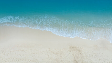 Beach Wave water in the Tropical summer beach with  sandy beach background - obrazy, fototapety, plakaty