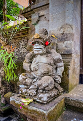 art ancient god statues with smile at Bali