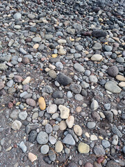 Top view of floor with round basalt rocks