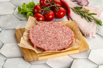 Raw beef uncooked burger cutlet